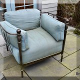 L03a. 4 Curved metal patio chairs with blue cushions. 
